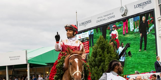 Rich Strike, ridden by jockey Sonny Leon, wins the 148th Kentucky Derby, Saturday, May 7, 2022, at Churchill Downs in Louisville, Ky. 