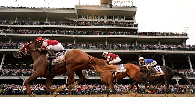 Horses racing in the Derby
