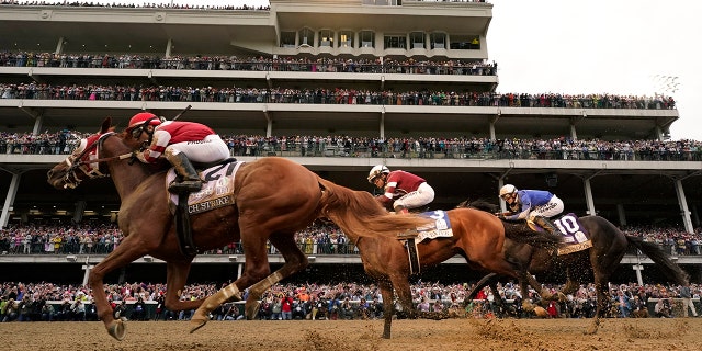 Horses racing in the Derby