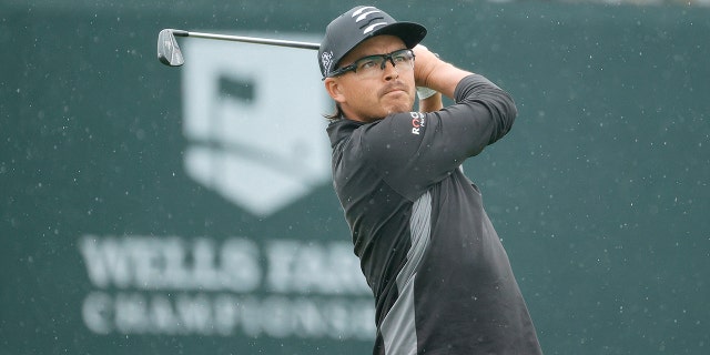 Rickie Fowler plays his shot during the Wells Fargo Championship at TPC Potomac Clubhouse on May 6, 2022, in Potomac, Maryland.