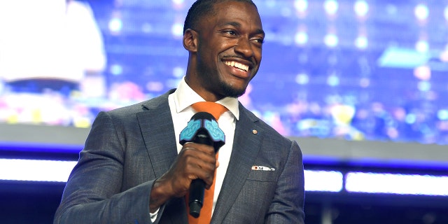 Robert Griffin III speaks onstage during round four of the 2022 NFL Draft on April 30, 2022, in Las Vegas, Nevada.