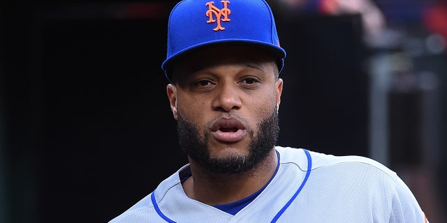 ST LOUIS, MO - APRIL 25: Robinson Cano #24 of the New York Mets looks on against the St. Louis Cardinals at Busch Stadium on April 25, 2022 in St Louis, Missouri.