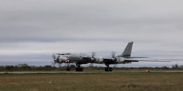 A Russian Tu-95 strategic bomber takes off during Russian-Chinese military aerial exercises to patrol the Asia-Pacific region, at an unidentified location, in this still image taken from a video released on Tuesday, May 24.