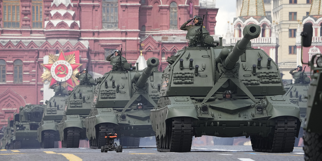 Russian self-propelled artillery vehicles roll during the Victory Day military parade in Moscow, Russia, on Monday, May 9.