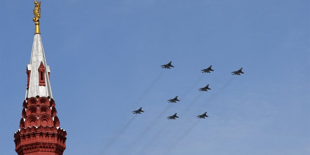 Russian MiG-29SMT jet fighters forming the symbol "Z" in support of the Russian armed forces fly in formation during a rehearsal for a flypast, part of a military parade marking the anniversary of the victory over Nazi Germany in World War II in central Moscow, Russia, May 7, 2022.