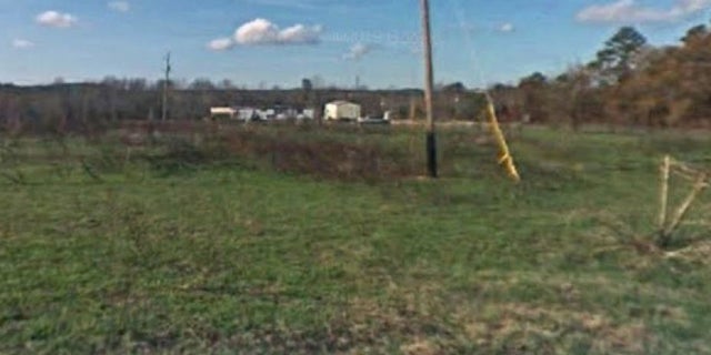 A field near some homes in Trenton, South Carolina. A South Carolina man died of a heart attack Saturday while burying his girlfriend, whom he strangled to death, authorities said.