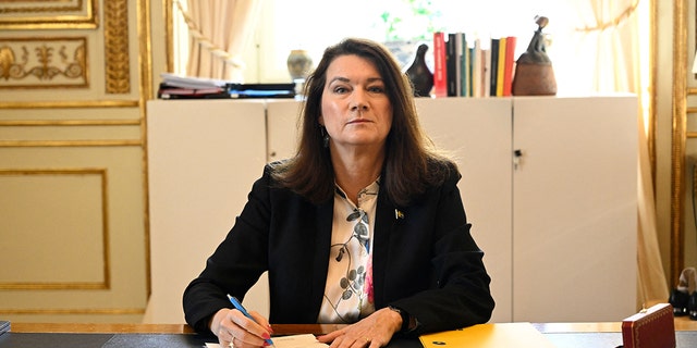 Sweden's Minister of Foreígn Affairs Ann Linde signs Sweden's application for NATO membership at the Ministry of Foreign Affairs in Stockholm, Sweden, on May 17, 2022.
