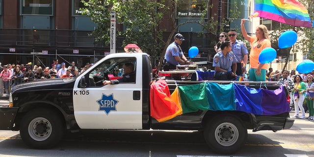 A San Francisco police vehicle during a Pride parade event.