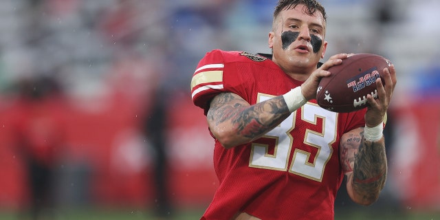 Scooby Wright III #33 of Birmingham Stallions warms up before the game against the New Jersey Generals at Protective Stadium on April 16, 2022 in Birmingham, Alabama.