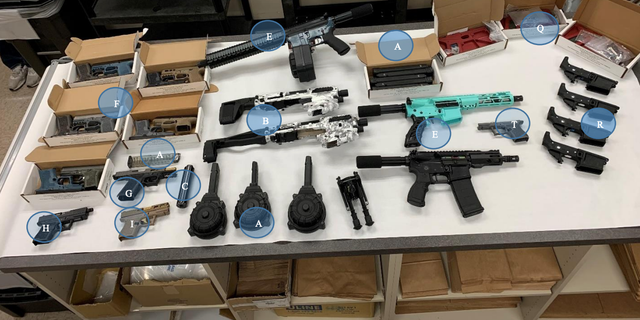 Jay James Olson was charged with manufacturing firearms without a license and possession of a machine gun after officers allegedly seized these weapons from his residence. 