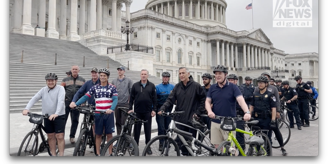 House Republicans pose for a photo in front of the Capitol Police "Go back to the Blue Bike tour".  (Gadget Clock Digital / John Michael Rush)