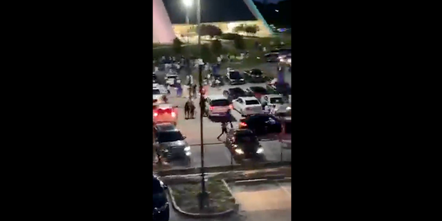 Video posted to social media showed people running and screaming after a shooting outside a high school graduation in Hammond, Louisiana.