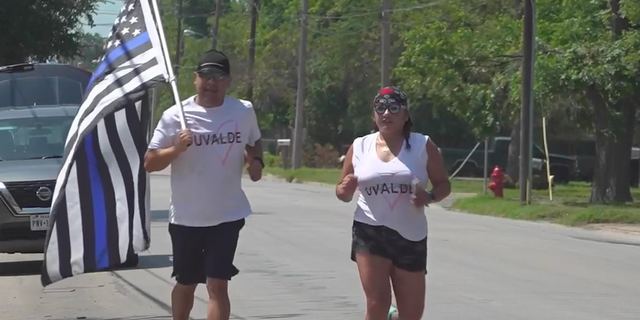 Jason Portillo and his wife, Gloria were part of a group who decided to run 21 miles in honor of the 21 victims on Saturday. 