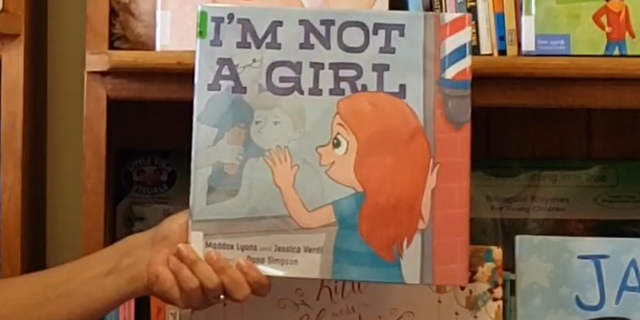 "I'm Not a Girl" is written by Maddox Lyons and Jessica Verdi about a transgender child.