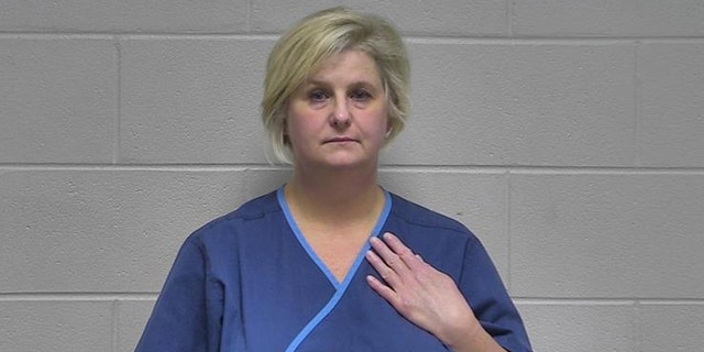 Dr. Stephanie Russell was booked into the Oldham County Jail in La Grange around 5:40 p.m. Thursday, jail records show. 
