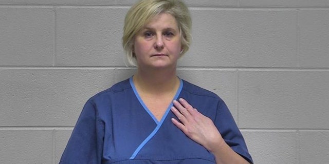 Dr. Stephanie Russell was booked into the Oldham County Jail in La Grange around 5:40 p.m. Thursday, jail records show.