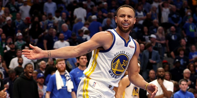 Stephen Curry #30 of the Golden State Warriors reacts after a no call foul against Luka Doncic #77 of the Dallas Mavericks during the fourth quarter in Game Three of the 2022 NBA Playoffs Western Conference Finals at American Airlines Center on May 22, 2022 a Dallas, Texas.