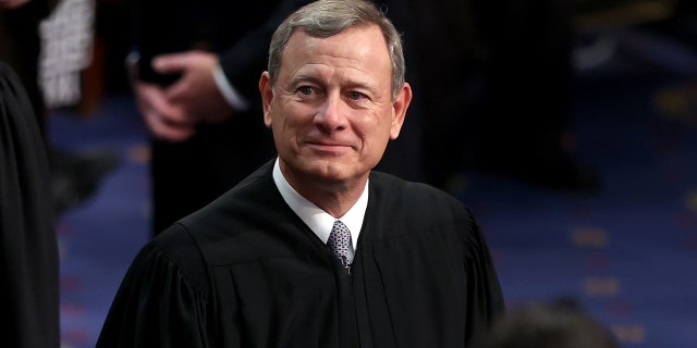 Supreme Court Chief Justice John Roberts prior to President Biden giving his State of the Union address during a joint session of Congress at the US Capitol March 1, 2022, in Washington. 