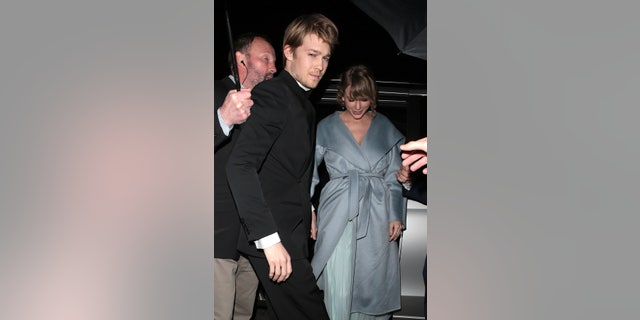 Joe Alwyn and Taylor Swift seen at the BAFTAs: Vogue x Tiffany Fashion and Film after party at Annabel's on Feb. 10, 2019 in London, England.