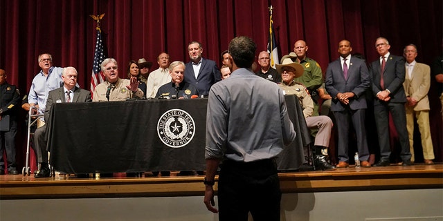 Texas Democratic gubernatorial candidate Beto O'Rourke disrupts a press conference held by Gov. Greg Abbott the day after a gunman killed 19 children and two teachers at Robb Elementary school in Uvalde, Texas, May 25, 2022.