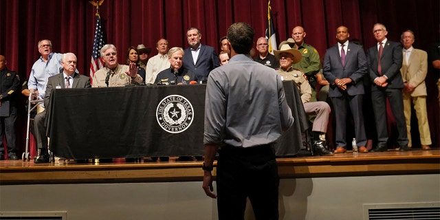 Texas Democratic gubernatorial candidate Beto O'Rourke disrupts a press conference held by Gov. Greg Abbott the day after a gunman killed 19 children and two teachers at Robb Elementary school in Uvalde, Texas, May 25, 2022.