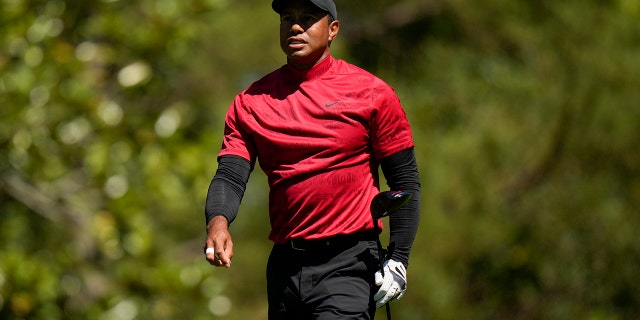Tiger Woods walks down the fifth fairway during the final round at the Masters, April 10, 2022, in Augusta, Georgia.