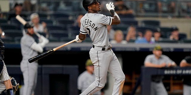 Chicago White Sox' Tim Anderson hits a three-run home run off New York Yankees relief pitcher Miguel Castro (30) in the eighth inning of the second baseball game of a doubleheader, Sunday, May 22, 2022, in New York.
