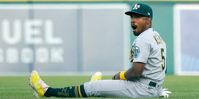Second baseman Tony Kemp #5 of the Oakland Athletics reacts after making a diving catch of a line drive hit by Jeimer Candelario of the Detroit Tigers during the eighth inning of Game Two of a doubleheader at Comerica Park on May 10, 2022, in Detroit, Michigan. The Athletics defeated the Tigers 4-1.