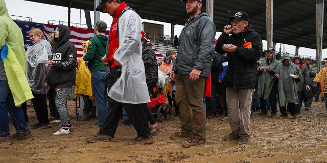 Trump supporters are seen as former President Donald Trump held a "Save America" rally despite the heavy rain and muddy field in Greensburg, Pennsylvania, May 6, 2022.