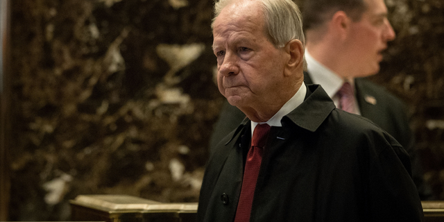 Robert 'Bud' McFarlane, National Security Advisor to President Ronald Reagan, walks through the lobby at Trump Tower, December 5, 2016 in New York City. President-elect Donald Trump and his transition team are in the process of filling cabinet and other high level positions for the new administration