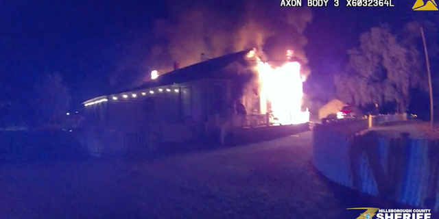 Sheriff's deputies in Seffner, Florida rescued a child from a burning house on Thursday night.