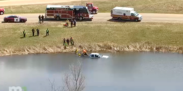 A man in Minnesota was rescued after being stuck on the top of his pickup truck which went into a pond in Lakeville.