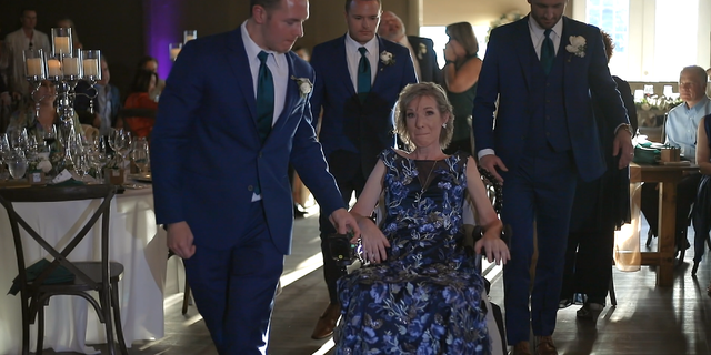 Zak Poirier shared the video that Daniel Cánepa of Valiant Weddings made after capturing the big day, which shows him and his brothers, Nick and Jake, escorting their mother, Kathy, to the dance floor.