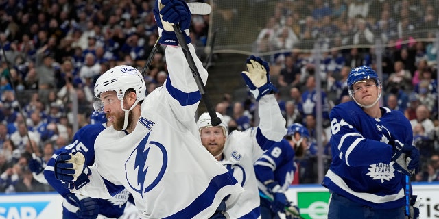 Tampa Bay Lightning defenseman Victor Hedman (77) celebrates his goal against the Toronto Maple Leafs with center Steven Stamkos (91) during the first period of Game 2 of an NHL hockey Stanley Cup playoffs first-round series Wednesday, May 4, 2022, in Toronto.