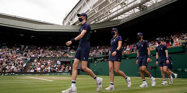 General view of the ball crew during the Ladies' Singles Final match between Ashleigh Barty of Australia and Karolina Pliskova of The Czech Republic at All England Lawn Tennis and Croquet Club on July 10, 2021 in London, England.