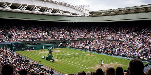 Ashleigh Barty and Karolina Pliskova during the ladies' singles final at All England Lawn Tennis and Croquet Club on July 10, 2021, in London.