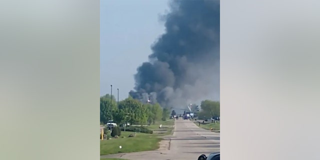 A fire burned at a marine construction company in Wisconsin, Thursday, May 19, 2022.