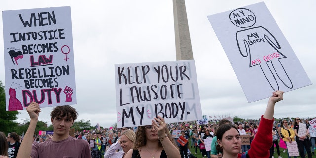 Abortion rights activist rally at the Washington Monument before a march to the U.S. Supreme Court in Washington, May 14, 2022. (Photo by JOSE LUIS MAGANA/AFP via Getty Images)