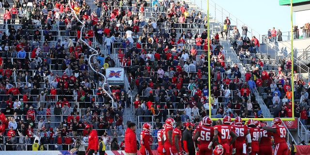 Fans create a 'beer snake' during the XFL game between the St. Louis BattleHawks and the DC Defenders at Audi Field on March 8, 2020 in Washington, DC.
