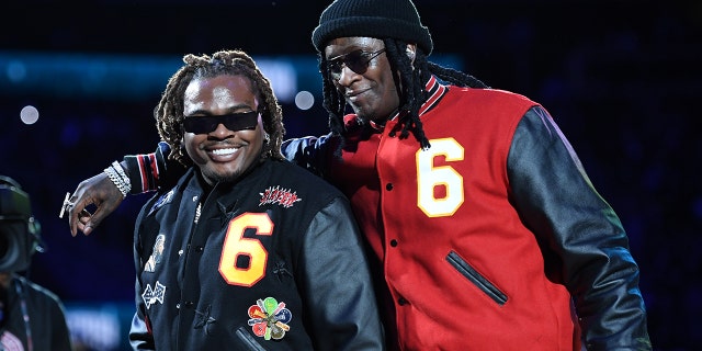 Gunna and Young Thug perform at halftime at the game between the Atlanta Hawks and the Boston Celtics on November 17, 2021, at State Farm Arena in Atlanta, Georgia. 