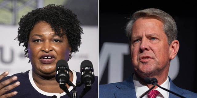 Stacey Abrams, sinistra, and Georgia Gov. Brian Kemp