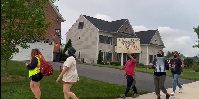 Protesters near the home of Justice Amy Coney Barrett.