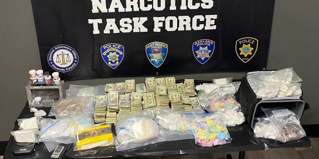 Sheriff's deputies seized 15 pounds of fentanyl, 2.2 pounds of heroin, and $139,000 from four suspects near an Oakland high school on Tuesday.