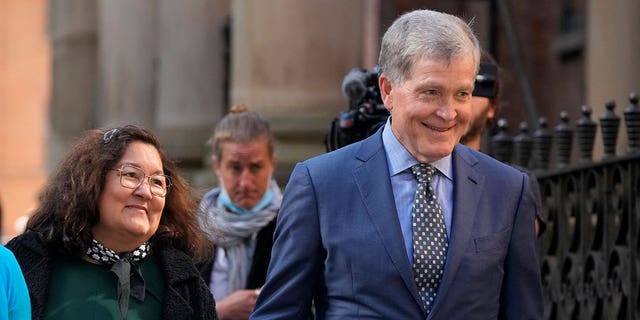 Steve Johnson and his wife Rosemarie arrive at the Supreme Court in Sydney, Monday, May 2, 2022, for a sentencing hearing in the murder of Scott Johnson, Steve's brother.