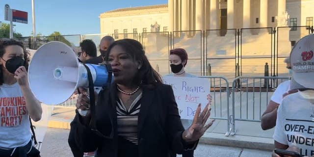 Rep. Coris Bush, D-Mo. protests outside the Supreme Court building in Washington, D.C.