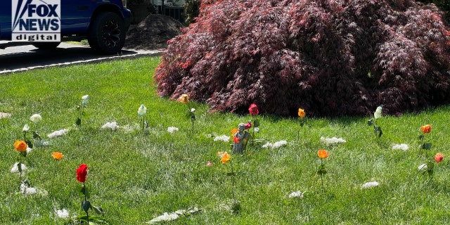 A 16-year-old murder suspect allegedly stabbed James McGrath outside this home on Laurel Glen Drive in Milford, Connecticut, where a memorial in the shape of a heart was placed outside. 