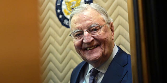 Former Vice President Walter Mondale smiles as he gets on an elevator on Capitol Hill in Washington, Jan. 3, 2018. Biden plans to speak at a memorial service in Minnesota Sunday, May 1, 2022, for Mondale, who died last April at age 93.  