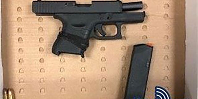 Boston police released a photo of a gun recovered after two juvenile males were arrested following a shots fired call in Mattapan.