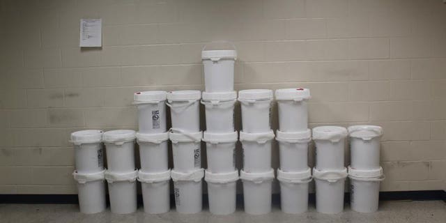 Buckets containing nearly 913 pounds of methamphetamine seized by CBP officers at World Trade Bridge.