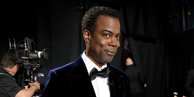 In this handout photo provided by A.M.P.A.S.,  Chris Rock is seen backstage during the 94th Annual Academy Awards at Dolby Theatre on March 27, 2022, in Hollywood, California. (Photo by Al Seib /A.M.P.A.S. via Getty Images)